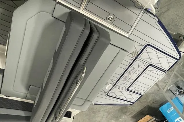 Slide: The Image of 2026 Chaparral SSX 6 boat interior with sleek seating and modern design elements. - 7