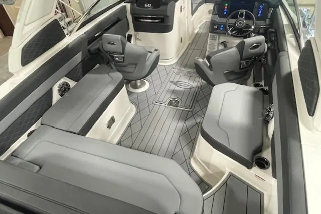 Slide: The Image of Interior of 2026 Chaparral SSX 6 boat with modern seating and dashboard. - 8