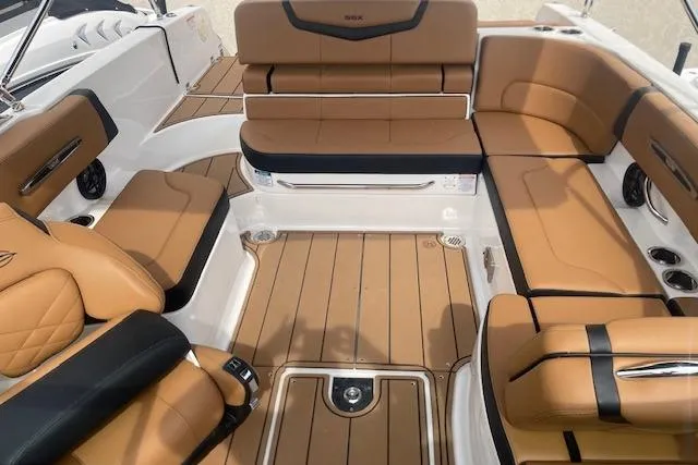 Slide: The Image of Luxurious interior of 2026 Chaparral SSX 6 boat with tan leather seating. - 10