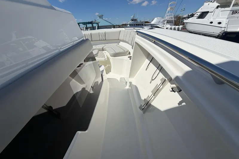 Slide: The Image of 2026 Pursuit S 358 Sport boat interior with sleek design and comfortable seating. - 105