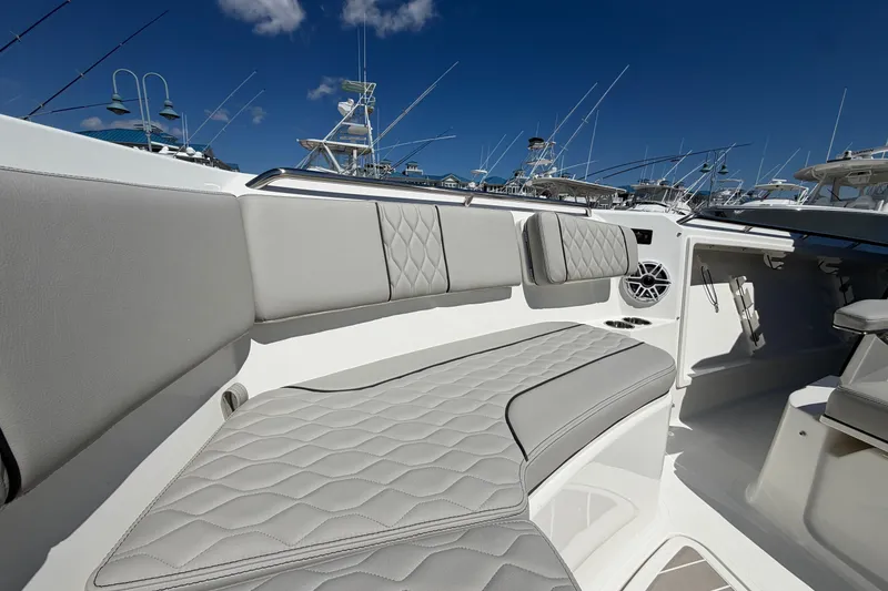 Slide: The Image of Luxurious seating on the 2026 Pursuit S 358 Sport boat, featuring elegant gray upholstery. - 117