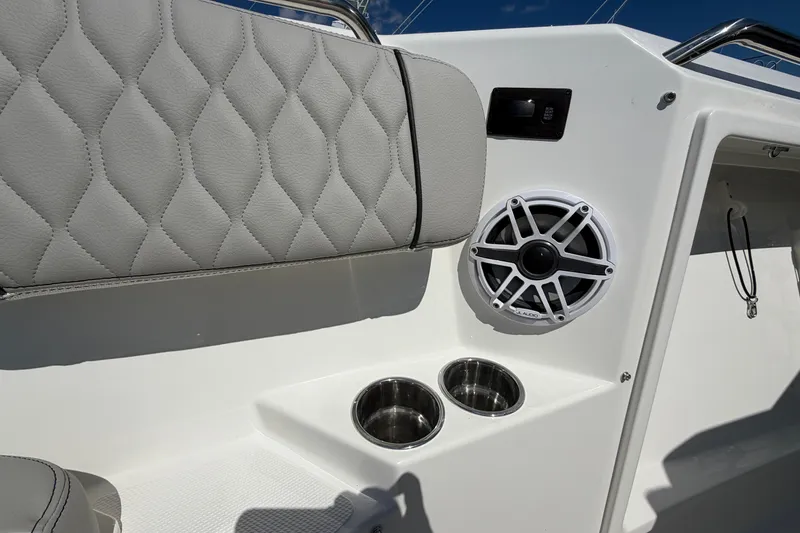 Slide: The Image of Interior of 2026 Pursuit S 358 Sport boat with speaker and cup holders. - 119