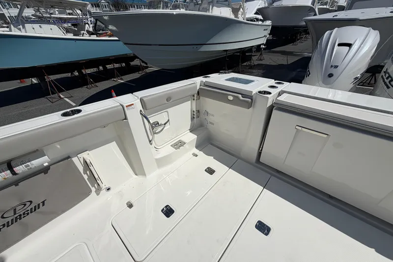 Slide: The Image of 2026 Pursuit S 358 Sport boat interior with sleek design and modern features. - 24