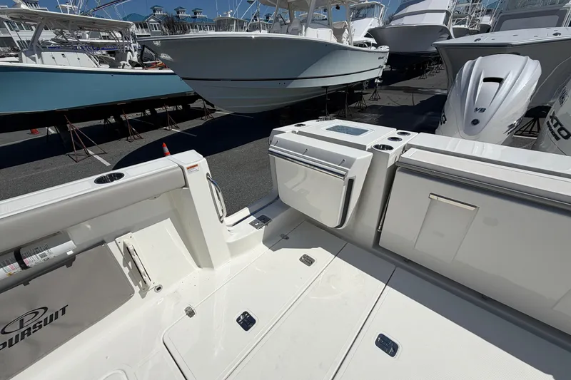 Slide: The Image of 2026 Pursuit S 358 Sport boat interior with sleek design and modern amenities. - 25