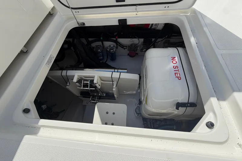 Slide: The Image of Open hatch of 2026 Pursuit S 358 Sport boat showing internal components. - 30