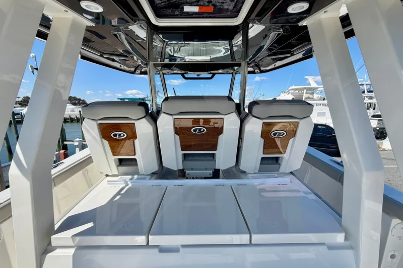 Slide: The Image of 2026 Pursuit S 358 Sport boat interior with sleek seating and modern design. - 42
