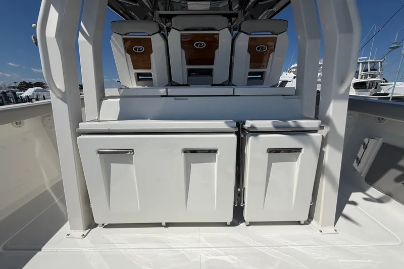 Slide: The Image of 2026 Pursuit S 358 Sport boat interior with seating and storage compartments. - 47