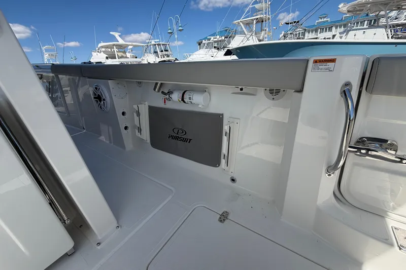 Slide: The Image of 2026 Pursuit S 358 Sport boat interior with sleek design and modern amenities. - 59