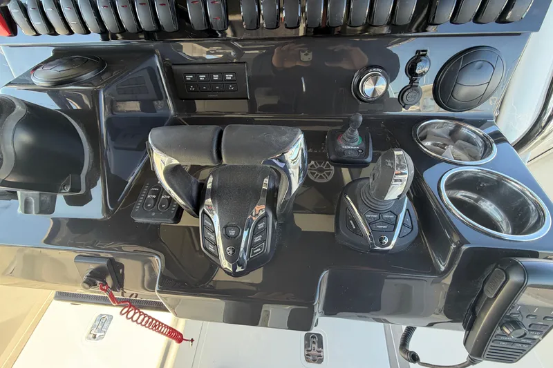 Slide: The Image of Control panel of 2026 Pursuit S 358 Sport boat with advanced navigation features. - 74