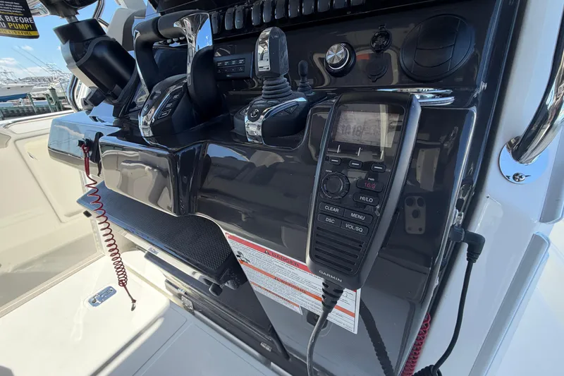 Slide: The Image of Control panel of 2026 Pursuit S 358 Sport boat with navigation equipment. - 82