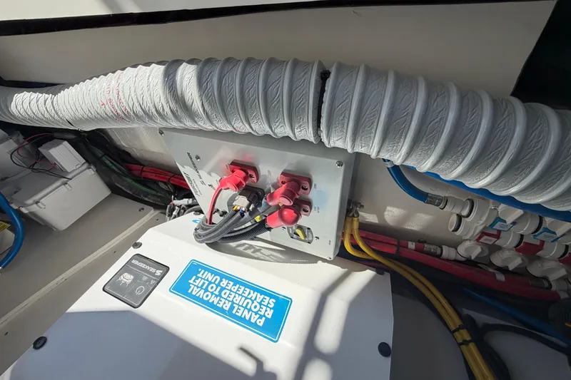 Slide: The Image of Electrical panel and wiring inside 2026 Pursuit S 358 Sport boat. - 85