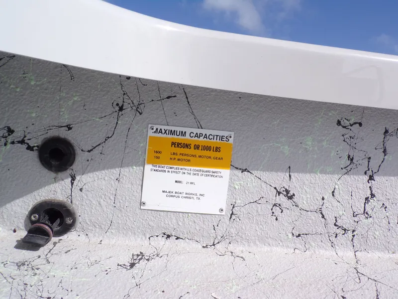 Slide: The Image of 2026 Majek 21 Redfish boat on trailer, Suzuki engine. - 10