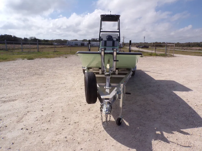 Slide: The Image of 2026 Majek 21 Redfish boat on trailer, ready for adventure. - 12