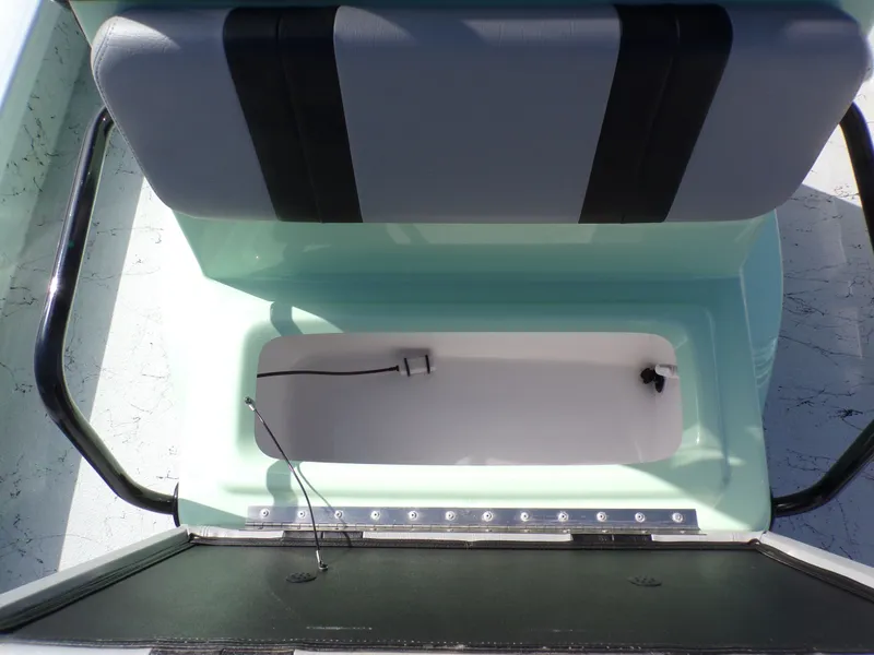 Slide: The Image of Majek 21 Redfish 2026 boat seat with storage compartment. - 19