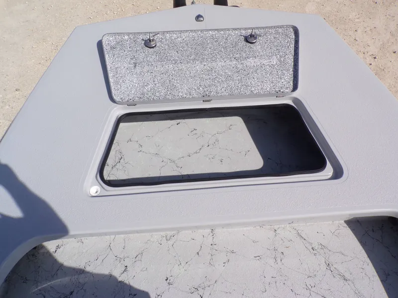 Slide: The Image of Majek 21 Redfish 2026 boat hatch with open lid. - 21