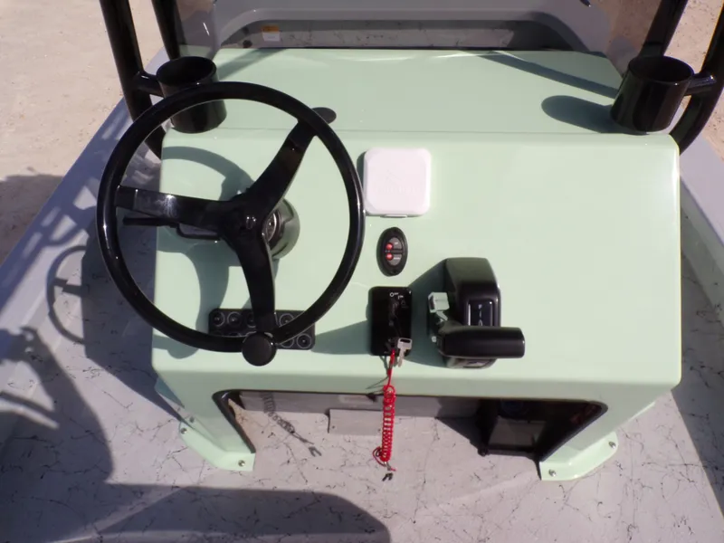 Slide: The Image of Steering console of Majek 21 Redfish boat, model year 2026. - 24