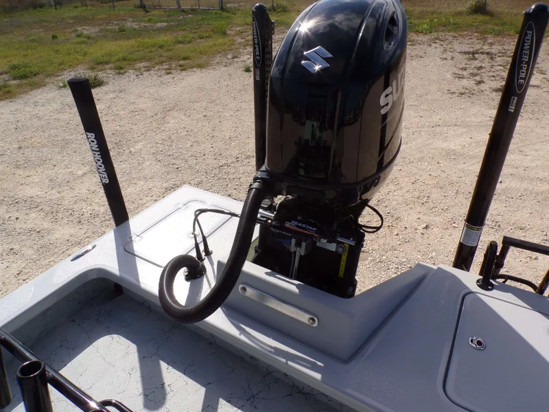 Slide: The Image of 2026 Majek 21 Redfish boat with Suzuki outboard motor. - 25