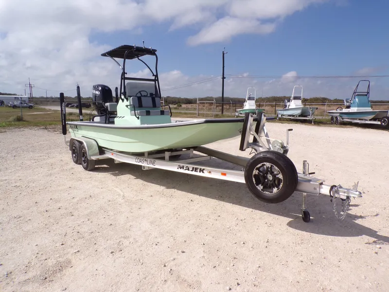 Slide: The Image of Majek 21 Redfish 2026 with outboard motor and Power-Pole anchors. - 5