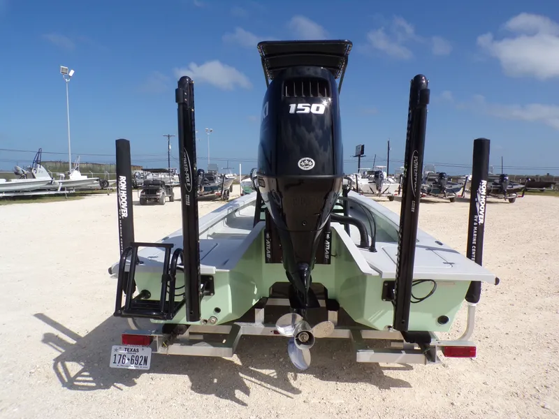 Slide: The Image of Majek 21 Redfish 2026 boat, storage compartment lid open. - 6