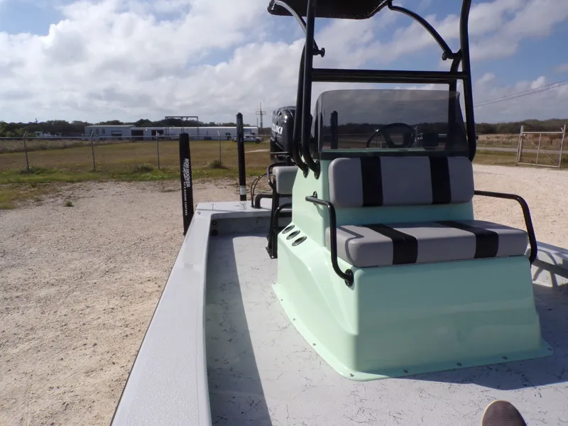 Slide: The Image of Majek 21 Redfish 2026 boat seat with fishing rod holders. - 8