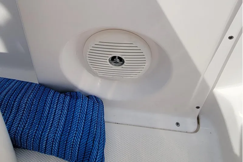 Slide: The Image of Control panel of a 2013 Everglades 230 Dual Console boat with labeled switches. - 10