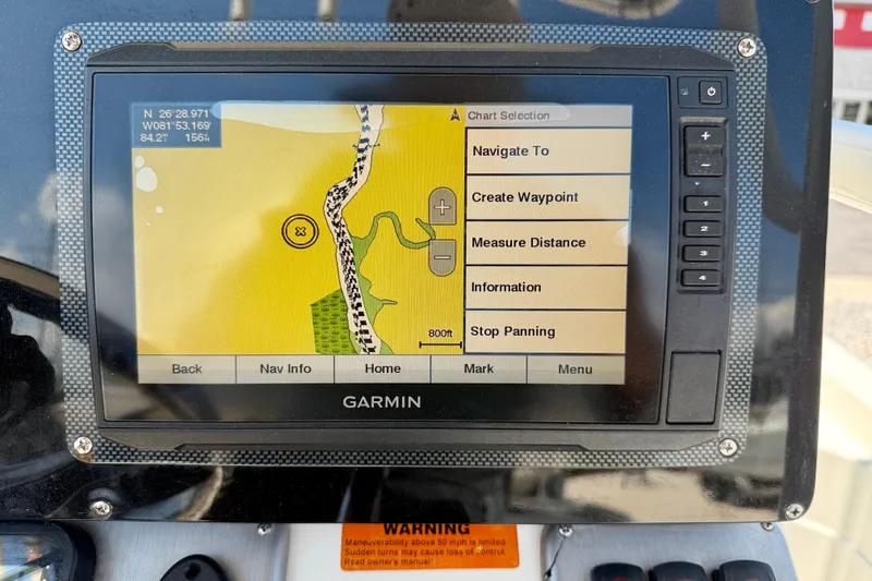 Slide: The Image of Garmin GPS navigation screen on a 2008 ShearWater 2400Z boat, displaying map and options. - 18