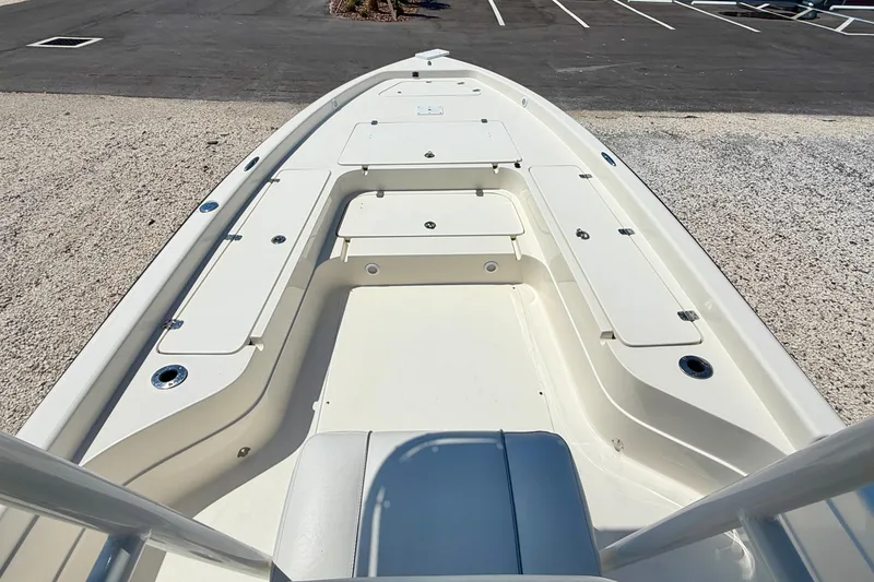 Slide: The Image of 2008 ShearWater 2400Z boat deck, featuring spacious storage compartments and sleek design. - 22