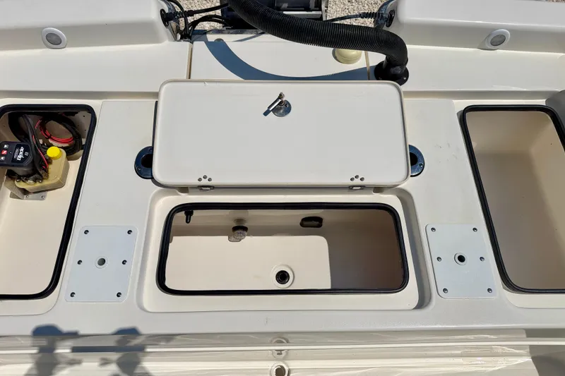 Slide: The Image of 2008 ShearWater 2400Z boat compartments and storage areas, showcasing interior layout. - 28