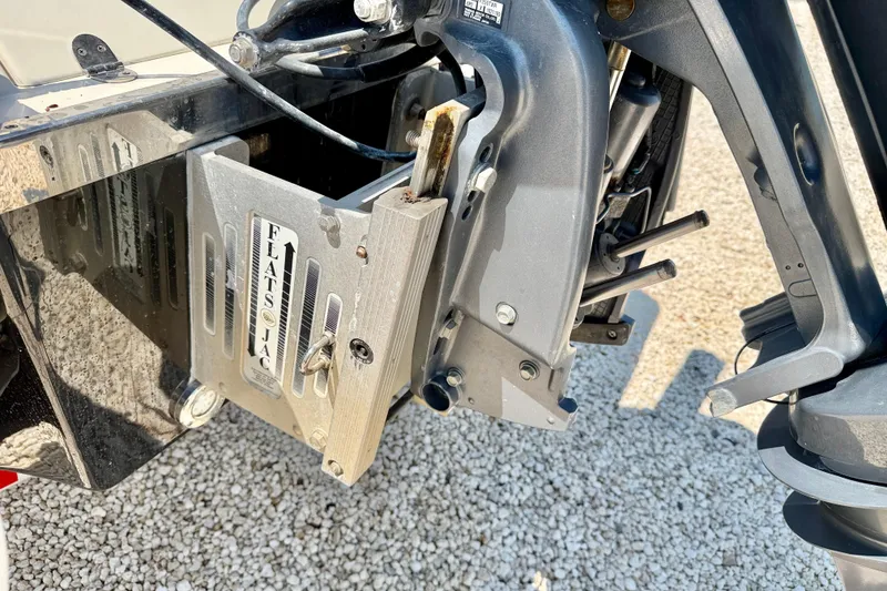 Slide: The Image of Close-up of a 2008 ShearWater 2400Z boat's motor mount and jack plate. - 31