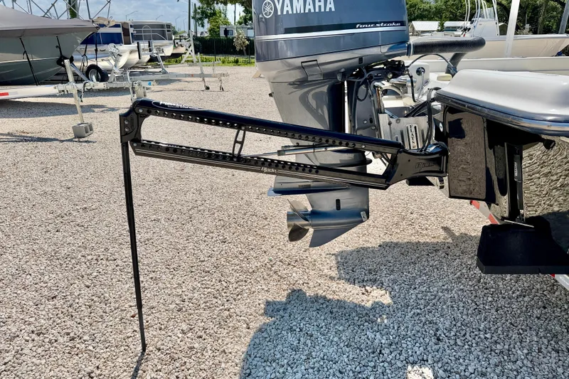 Slide: The Image of ShearWater 2400Z 2008 boat with Yamaha outboard motor on gravel lot. - 32