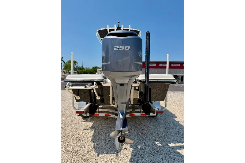 Slide: The Image of 2008 ShearWater 2400Z boat with Yamaha 250 outboard motor, parked on gravel. - 35