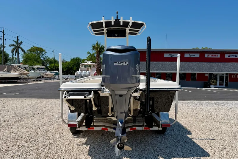 Slide: The Image of 2008 ShearWater 2400Z boat with Yamaha 250 engine, parked on gravel lot. - 6