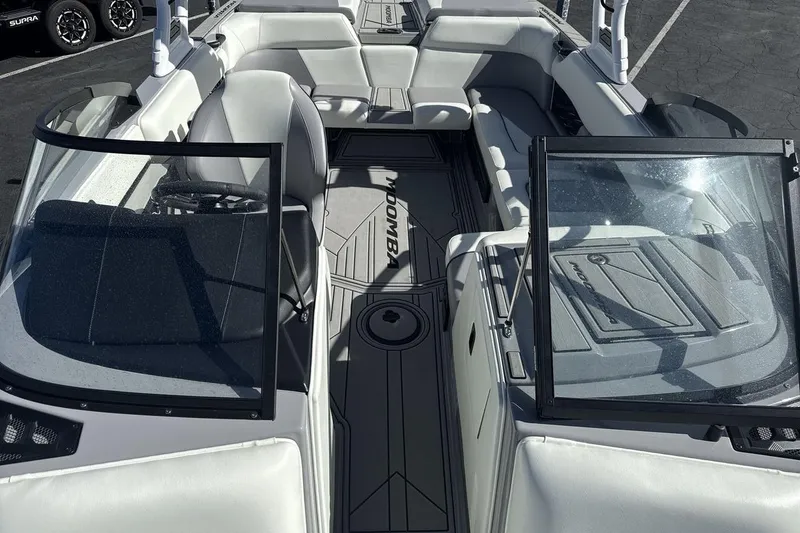 Slide: The Image of 2025 Moomba Craz boat interior with sleek seating and modern design. - 12