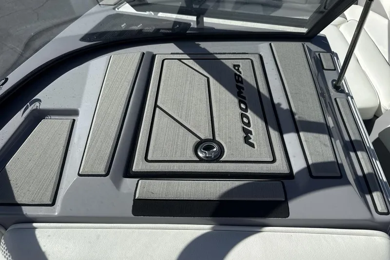 Slide: The Image of 2025 Moomba Craz boat dashboard with sleek design and branding details. - 18