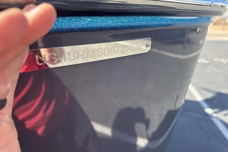 Slide: The Image of 2025 Moomba Craz boat with visible hull identification number plate. - 25