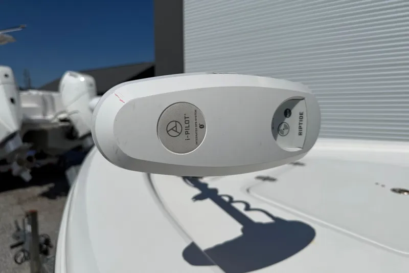 Slide: The Image of Close-up of i-Pilot Riptide control on 2021 Sea Pro 248 Bay boat. - 16