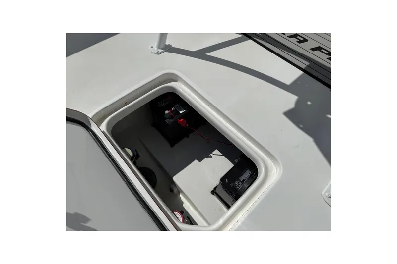 Slide: The Image of Battery compartment of 2021 Sea Pro 248 Bay boat, showcasing internal components. - 31
