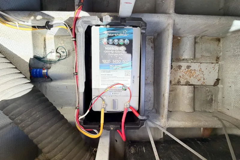 Slide: The Image of Battery installation in a 1988 Pacemaker 36 Convertible boat, featuring NorthStar NSB-AGM 8D-S. - 109