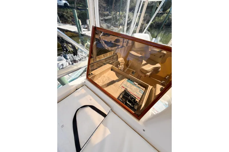 Slide: The Image of Interior view of a 1988 Pacemaker 36 Convertible boat with seating and equipment. - 43