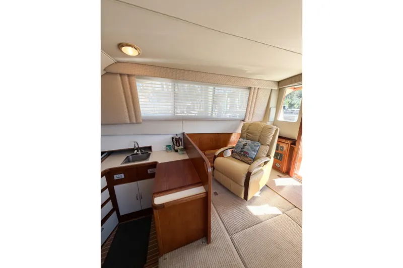 Slide: The Image of Interior of 1988 Pacemaker 36 Convertible yacht with recliner and kitchenette. - 50