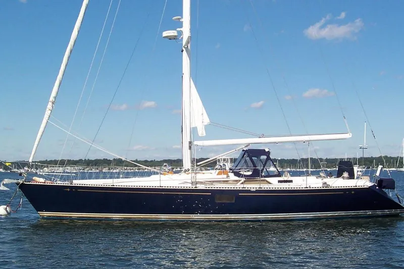 The Image of Sailing yacht C&C 51' XL / CB, 1994 model, on calm waters under clear skies. - 0