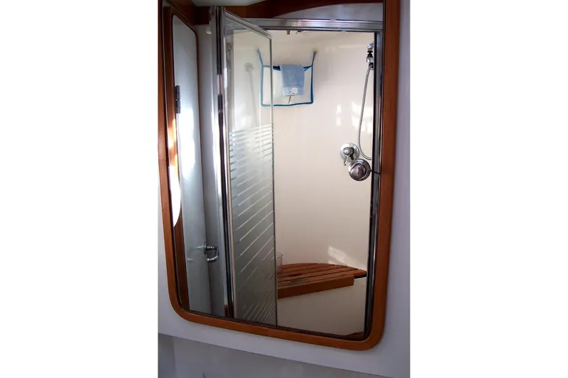 Slide: The Image of Shower area in a 1994 C&C 51' XL / CB yacht with wooden accents. - 29