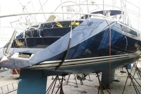 Slide: The Image of 1994 C&C 51' XL / CB yacht in dry dock, blue hull, undergoing maintenance. - 38