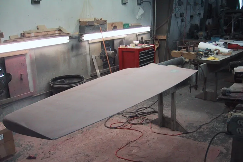 Slide: The Image of Workshop with a 1994 C&C 51' XL / CB boat component under construction. - 43