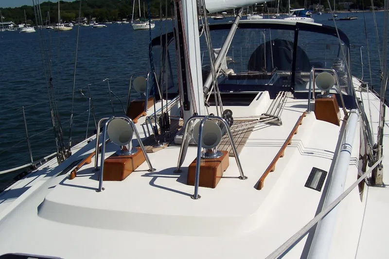 Slide: The Image of Deck view of 1994 C&C 51' XL / CB sailboat on calm water. - 7