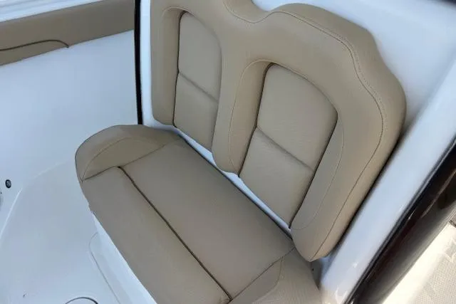 Slide: The Image of 2017 Sea Hunt Gamefish 25 boat seat with beige upholstery. - 12