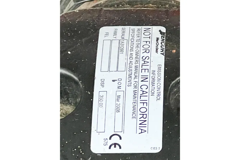 Slide: The Image of Label on Mercury engine, not for sale in California, Rinker Fiesta Vee 330, 2000 model. - 60