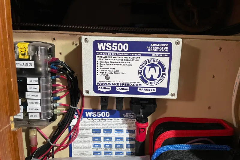 Slide: The Image of Control panel on 1985 Passport 470 Center Cockpit yacht with wooden cabinetry. - 8