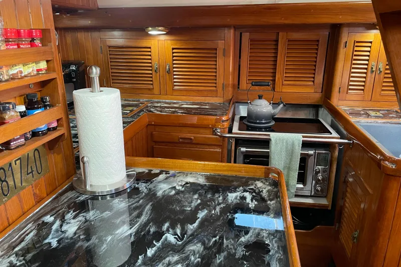 Slide: The Image of WS500 advanced alternator regulator in a 1985 Passport 470 Center Cockpit boat. - 9