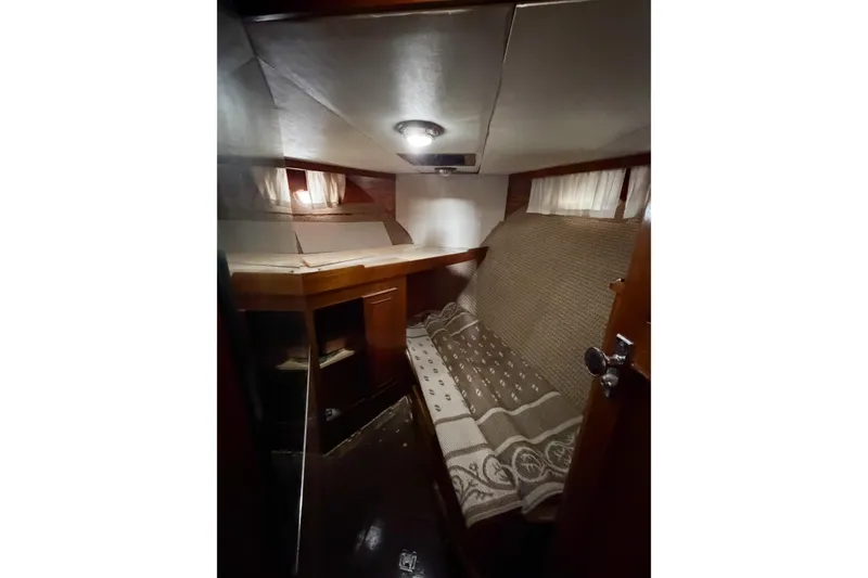 Slide: The Image of Cozy cabin interior of 1989 Jefferson Marquessa 52 Extended Deckhouse yacht. - 72